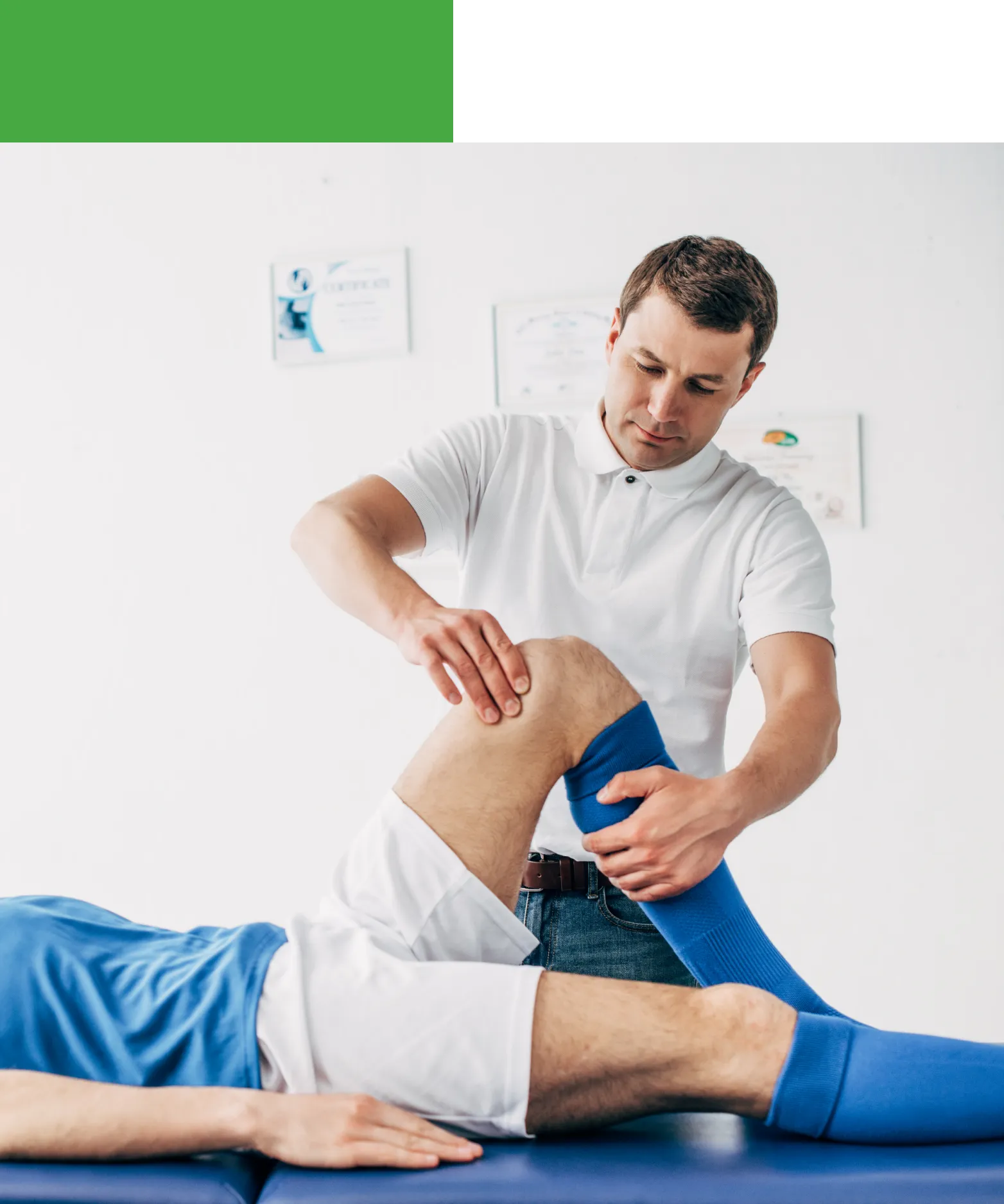 Physical therapist examining patient's knee.